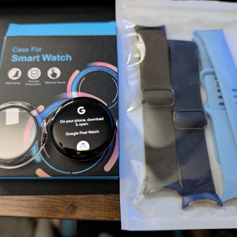 Google Pixel Watch with Black and Blue Bands